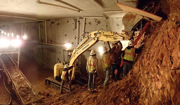 The Evolution of Innovation: Tunneling Through a Railroad Embankment with Live Traffic Overhead