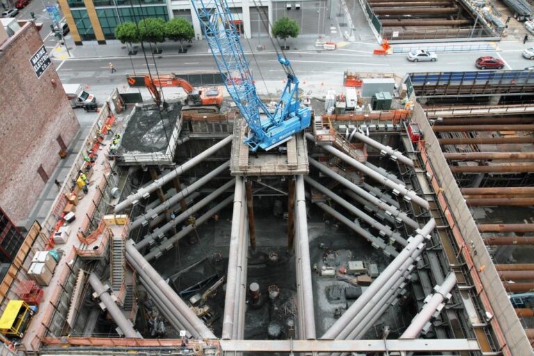 Crane supported by trestle during construction of 181 Fremont