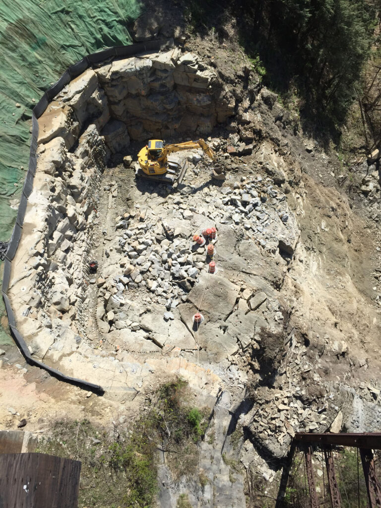 Post blasting rock removal-eastside looking down on rock bench