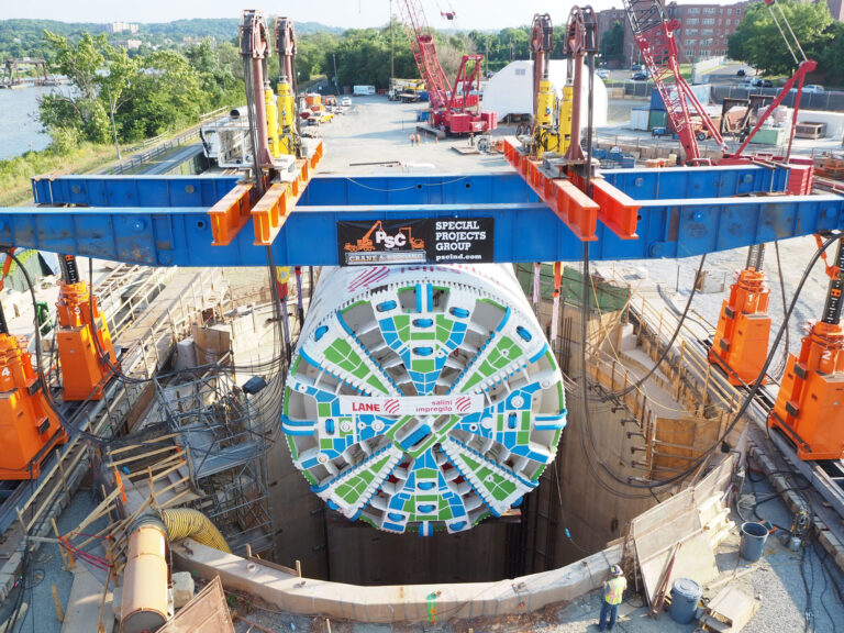 Lowering TBM Chris into shaft at Northeast Boundary Tunnel