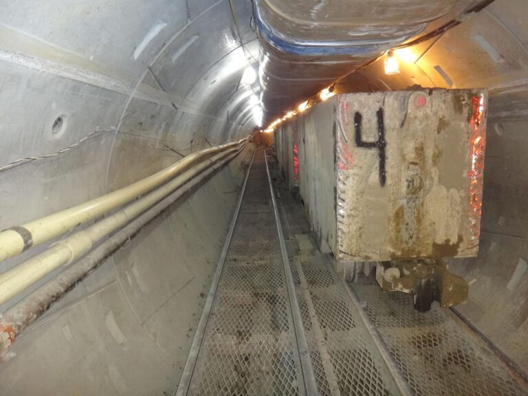 Muck train inside tunnel