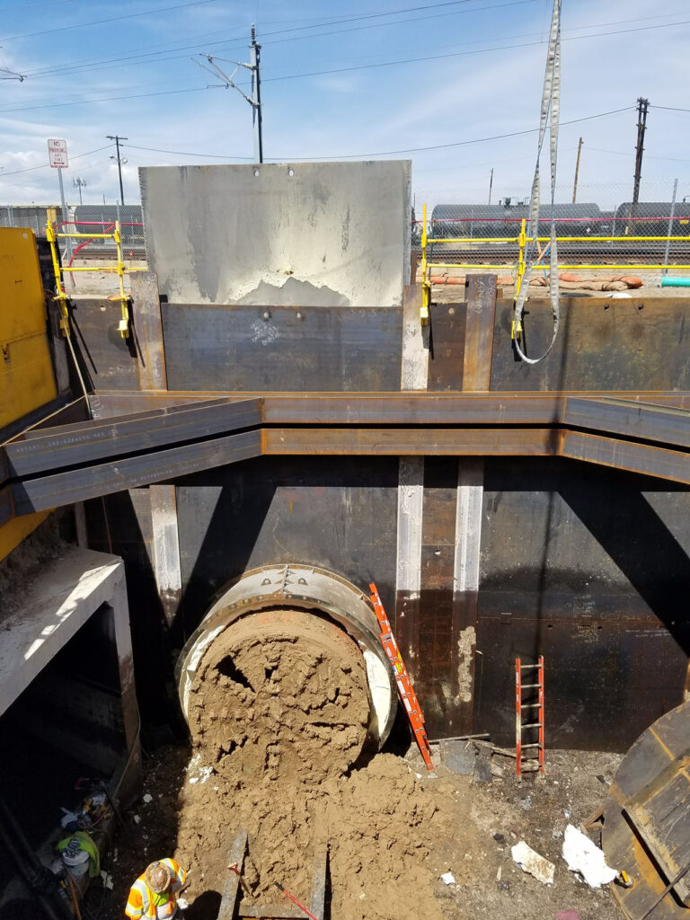 MTBM Breakthrough into shaft with trains above