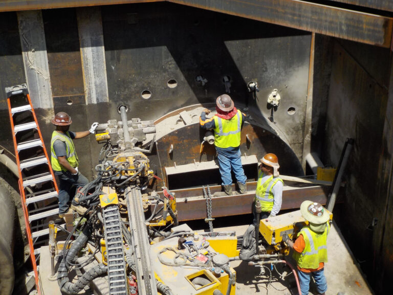 Miners in shaft during construction, Globeville Landing Outfall Tunnels