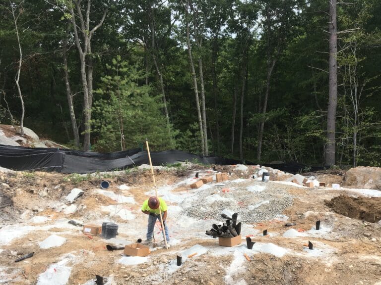 Loading holes with explosives, Maline Creek CSO project, St. Louis, MO