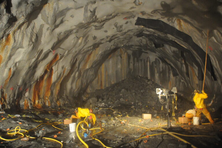 Loading explosives for drill and blast excavation of starter tunnel