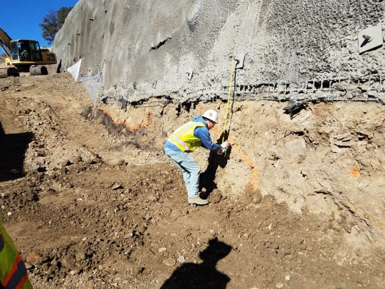 Taking measurements for Trinidad Slope Stabilizatioin