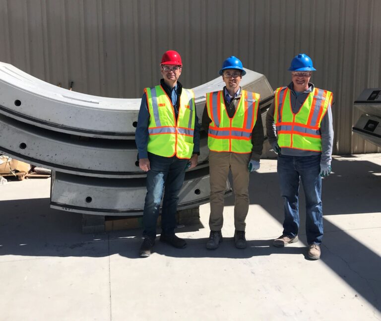 Project Team in Front of Tunnel Segments